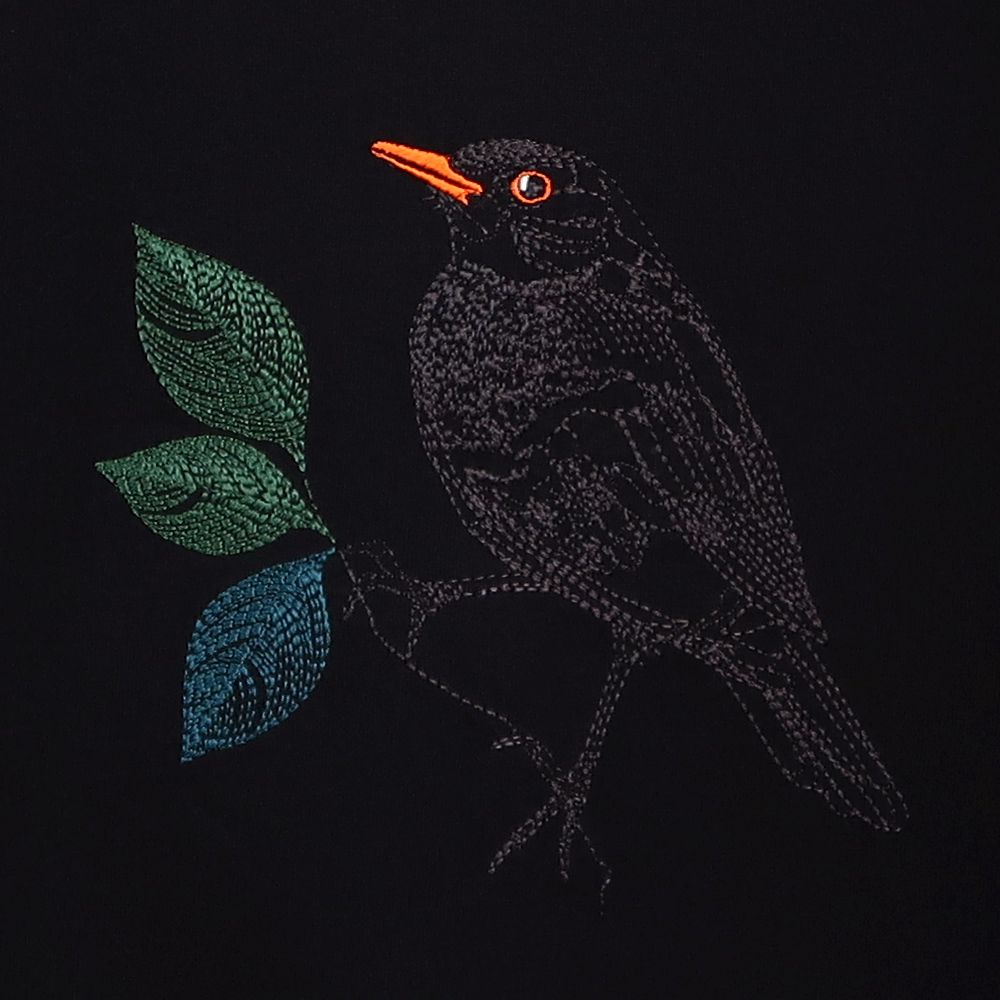 Organic T-shirt with a black bird in the night embroidered Made in Paris France by philippegaber